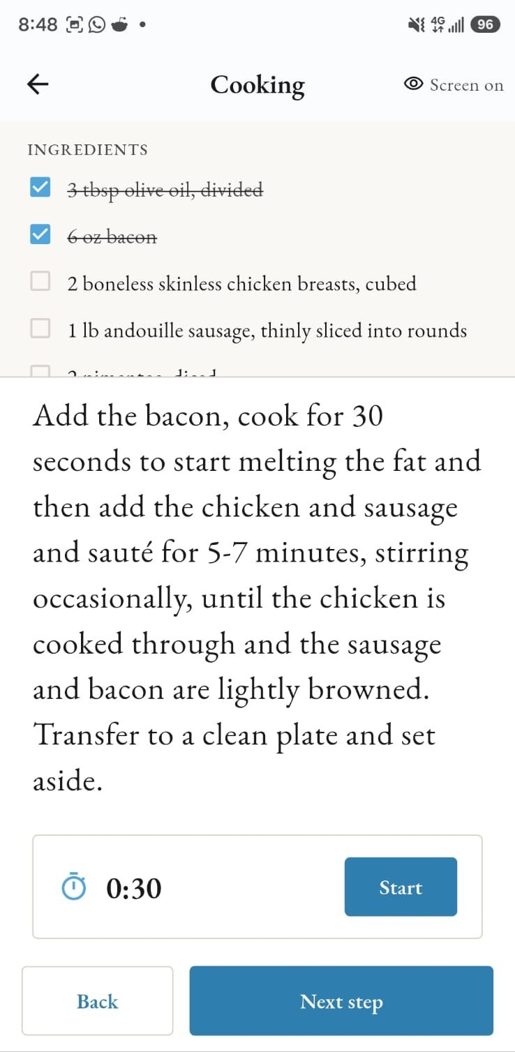 Cooking mode showing an ingredient checklist, the current step and a timer
